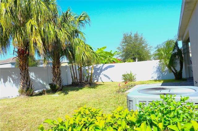 1569 Thetford Cir, Orlando, FL 32824 - view of yard with central AC