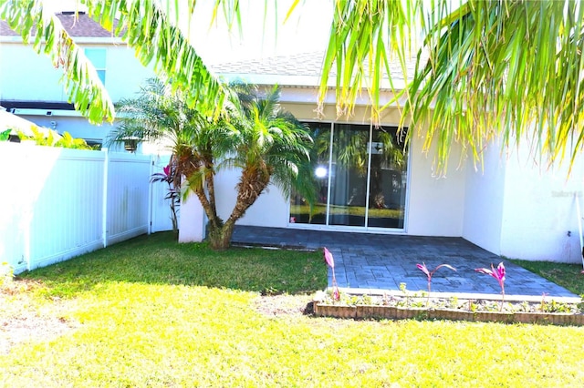 1569 Thetford Cir, Orlando, FL 32824 - view of yard featuring a patio area