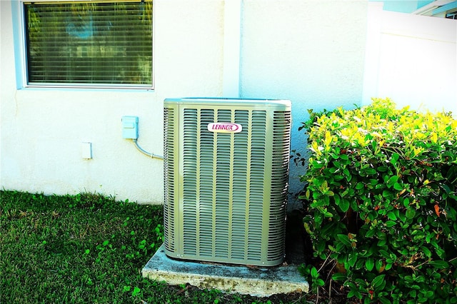1569 Thetford Cir, Orlando, FL 32824 - exterior view of cooling unit and stucco siding