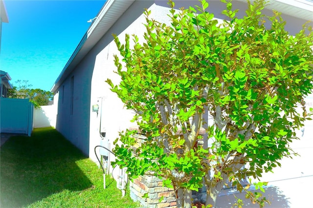 1569 Thetford Cir, Orlando, FL 32824 - view of side of property featuring stucco siding