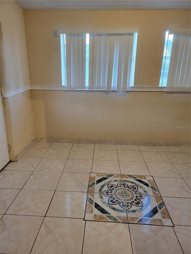 566/568 Imperial Pl, Kissimmee, FL 34758 - spare room featuring plenty of natural light
