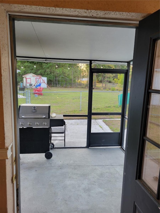 566/568 Imperial Pl, Kissimmee, FL 34758 - sunroom / solarium featuring healthy amount of natural light
