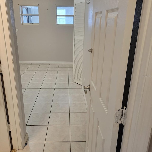 566/568 Imperial Pl, Kissimmee, FL 34758 - bathroom featuring tile patterned flooring and baseboards