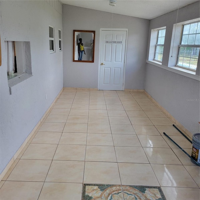 566/568 Imperial Pl, Kissimmee, FL 34758 - hall with tile patterned floors