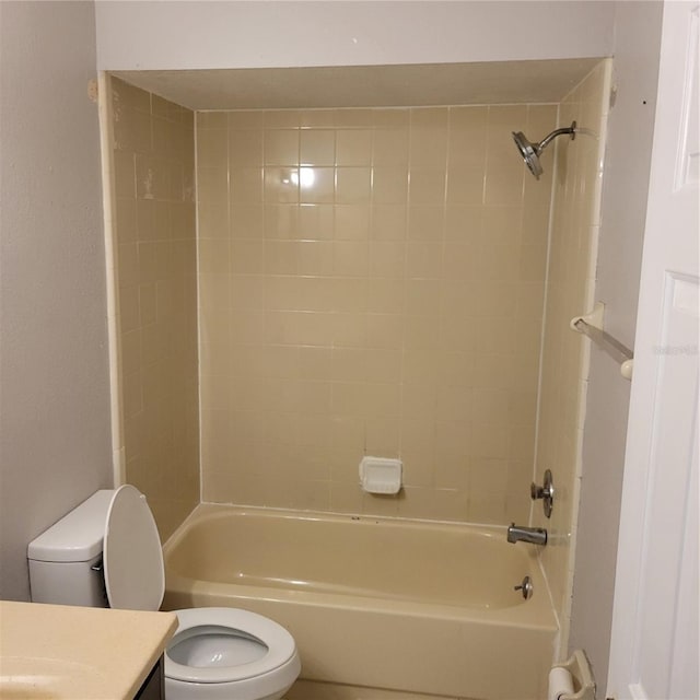 566/568 Imperial Pl, Kissimmee, FL 34758 - full bathroom featuring toilet, vanity, and  shower combination