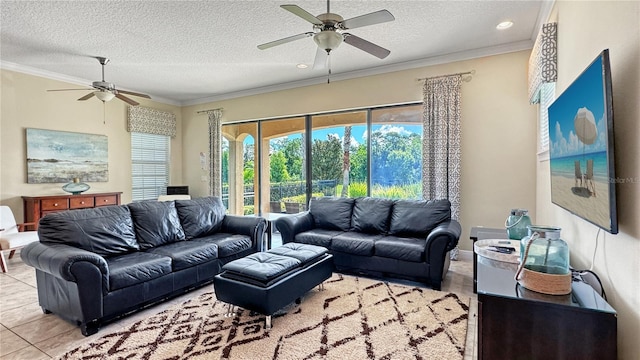 living room with crown molding, light tile patterned flooring, a textured ceiling, and ceiling fan