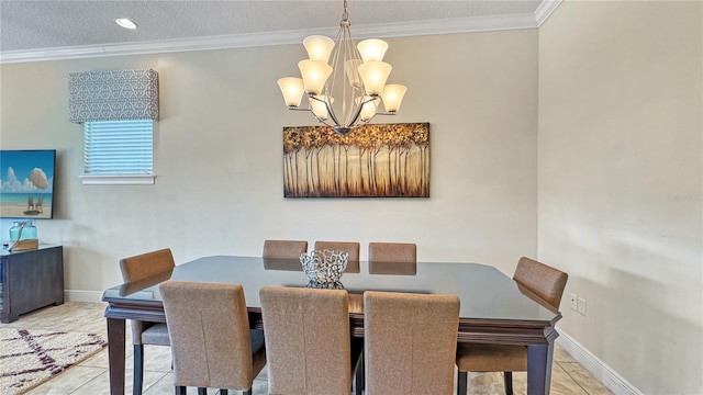 tiled dining space with a textured ceiling, a notable chandelier, and crown molding