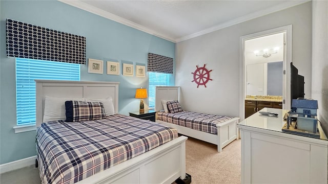 bedroom featuring connected bathroom, light colored carpet, and crown molding