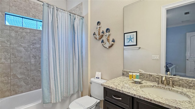 full bathroom featuring vanity, toilet, and shower / bath combo with shower curtain