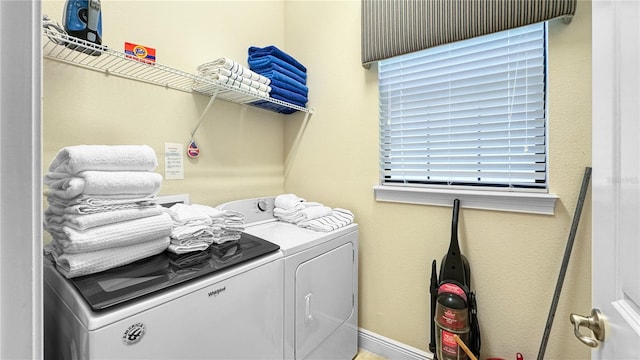 laundry room featuring independent washer and dryer