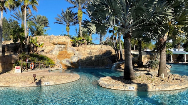 view of swimming pool with central AC