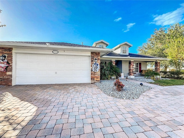 single story home featuring a garage