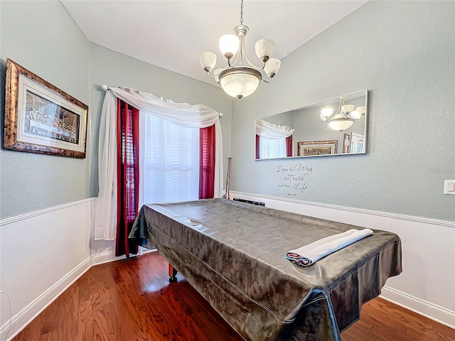 recreation room featuring dark hardwood / wood-style flooring, a notable chandelier, and billiards