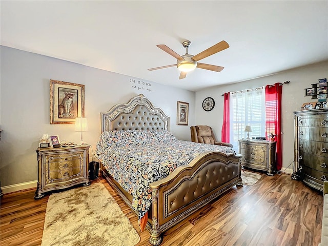 bedroom featuring wood-type flooring and ceiling fan