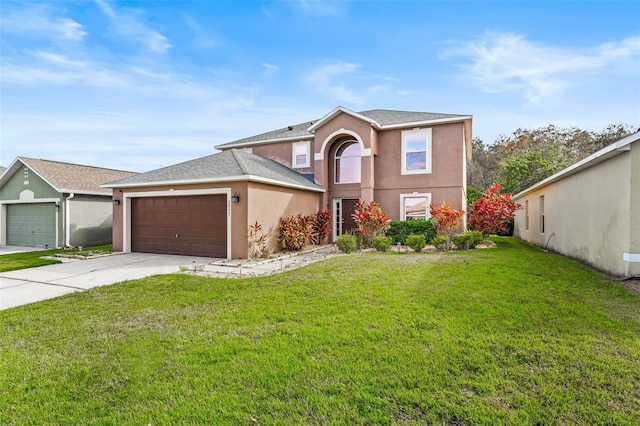 view of front property with a front yard and a garage