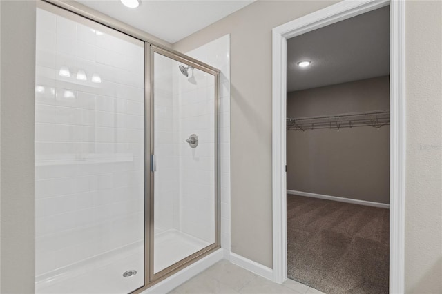 bathroom featuring an enclosed shower