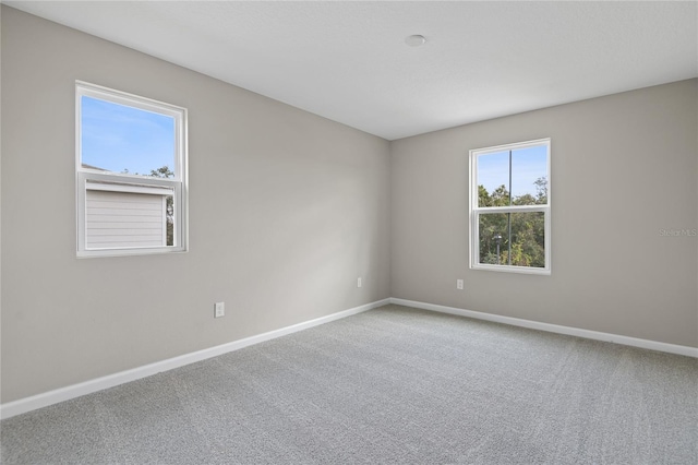 view of carpeted spare room