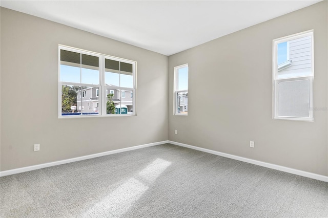 unfurnished room with carpet