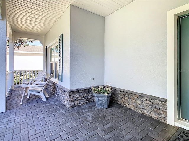 view of patio featuring covered porch