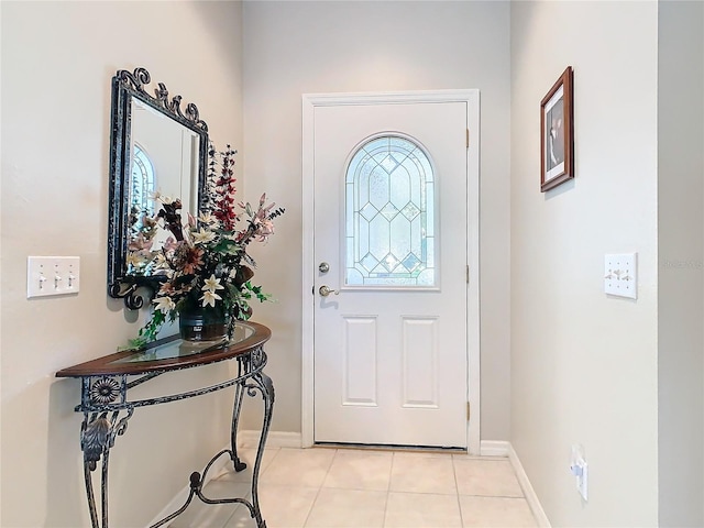 foyer with light tile patterned floors