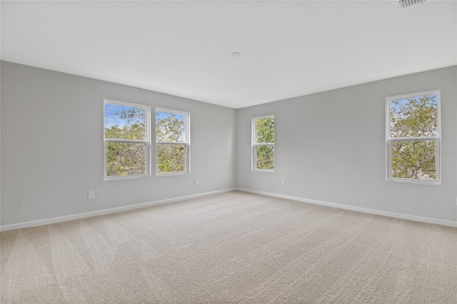 view of carpeted spare room