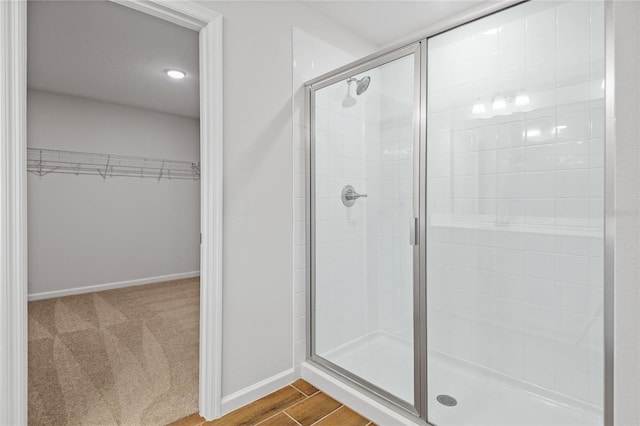 bathroom featuring walk in shower