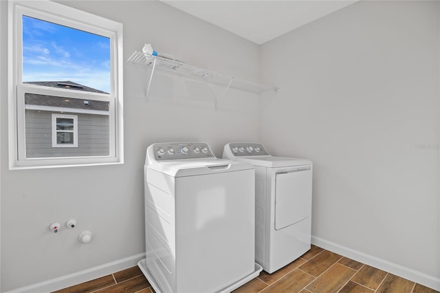 laundry room with separate washer and dryer