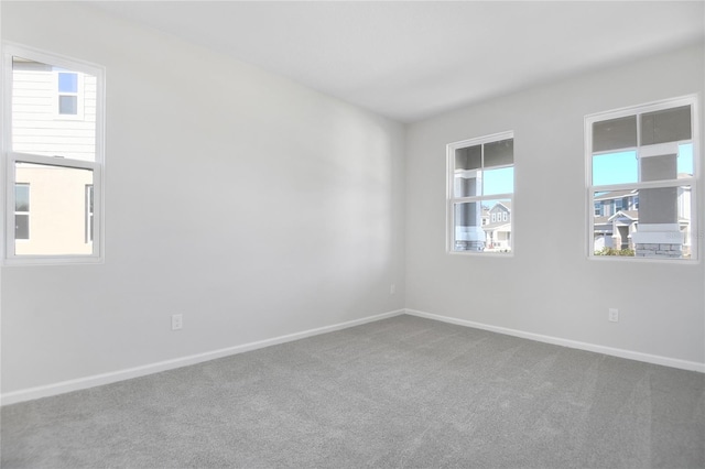 unfurnished room with carpet