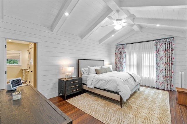 bedroom featuring ceiling fan, wooden walls, lofted ceiling with beams, and hardwood / wood-style flooring