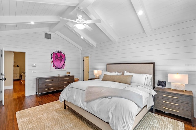 bedroom with ceiling fan, wood walls, lofted ceiling with beams, and dark hardwood / wood-style floors