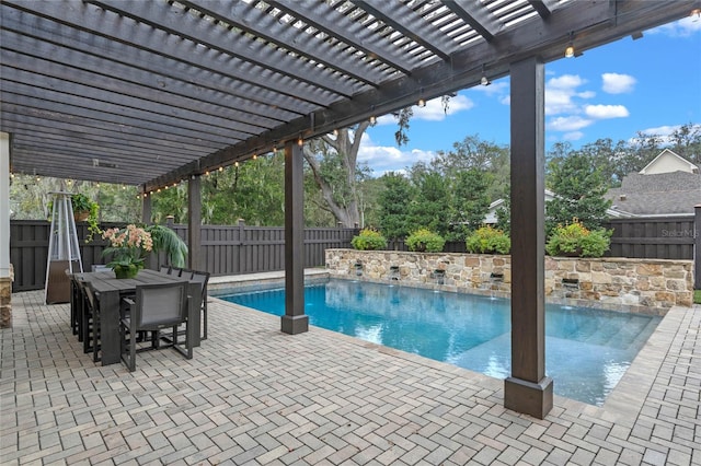 view of pool featuring a pergola and a patio