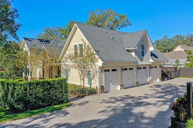 view of property exterior with a garage