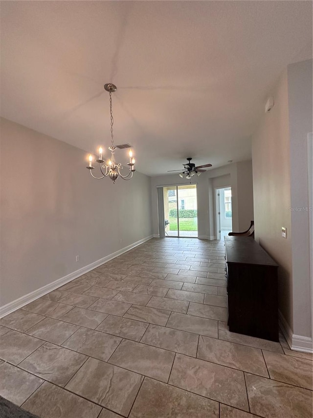 unfurnished room with ceiling fan with notable chandelier