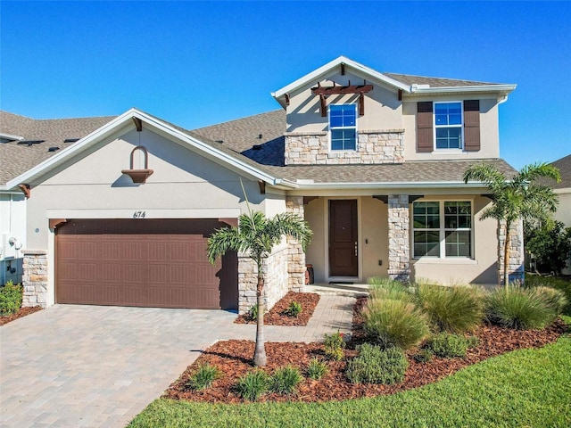 craftsman house with a garage