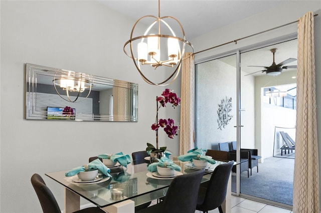 carpeted dining space featuring ceiling fan with notable chandelier