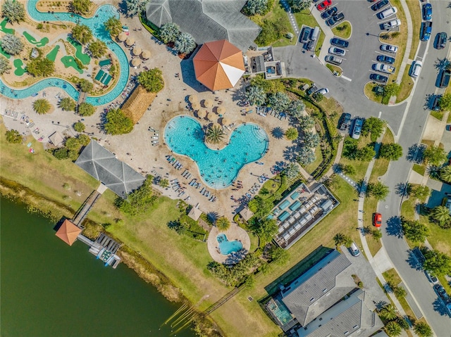 birds eye view of property featuring a water view