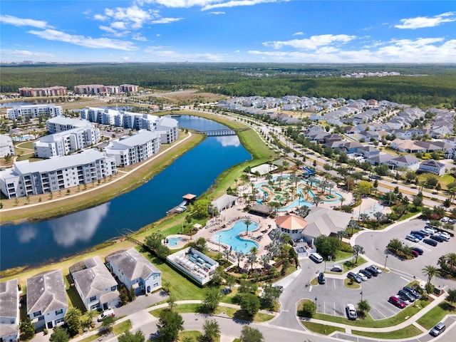 birds eye view of property featuring a water view