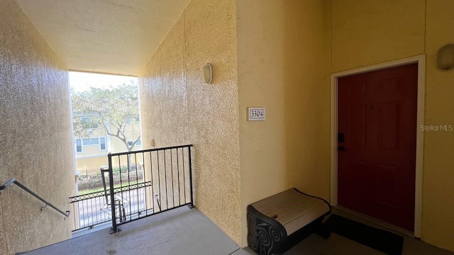 property entrance with a balcony