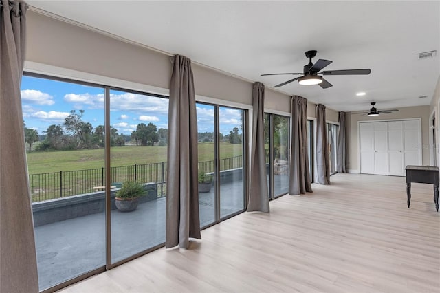 interior space featuring ceiling fan