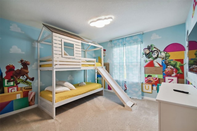 carpeted bedroom with a textured ceiling