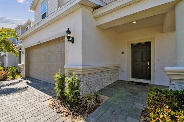 entrance to property with a garage