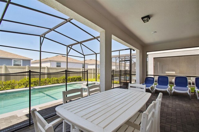 view of patio featuring a fenced in pool and a lanai