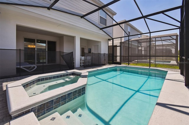 view of pool featuring an in ground hot tub, a lanai, exterior bar, and a patio area