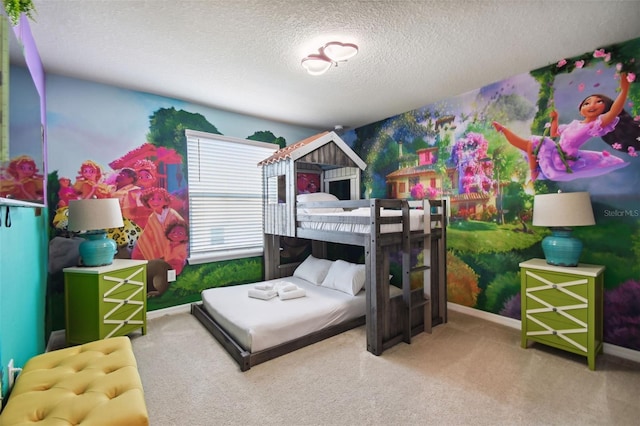 carpeted bedroom featuring a textured ceiling