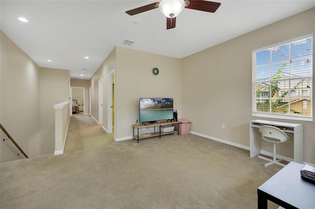 interior space featuring ceiling fan