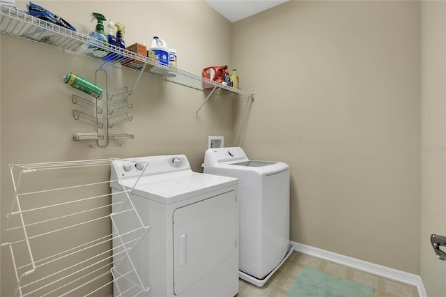 laundry room featuring washing machine and dryer