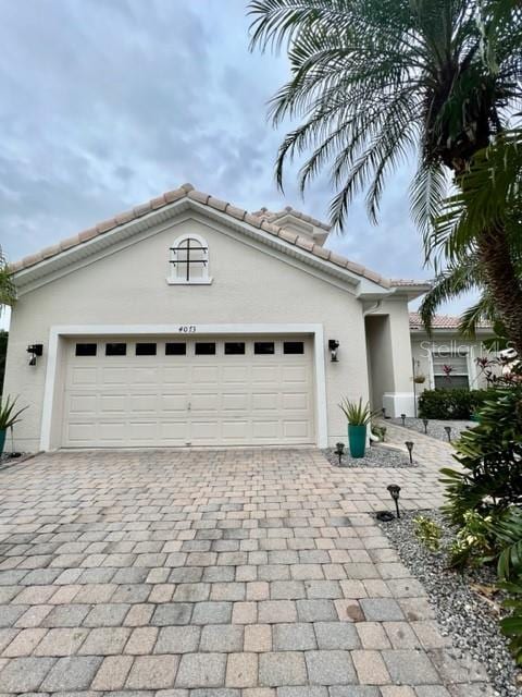 view of front of home with a garage