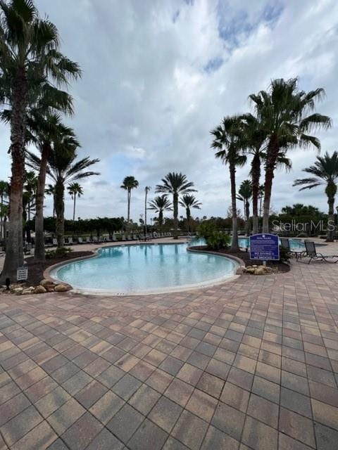 view of pool with a patio