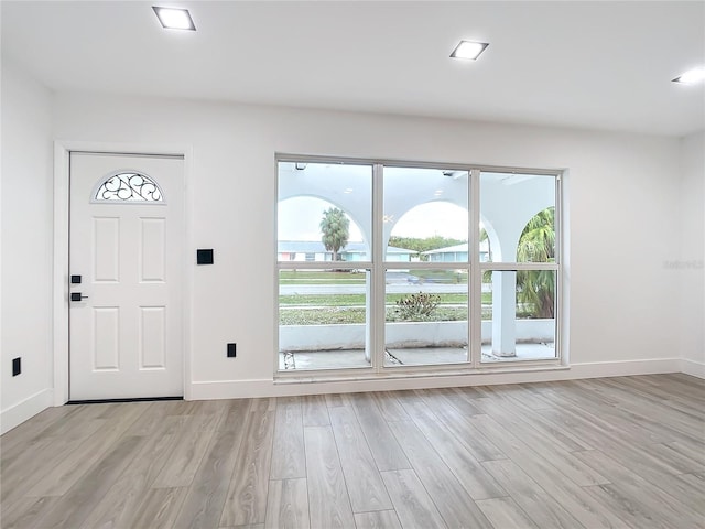 foyer entrance featuring light wood-type flooring