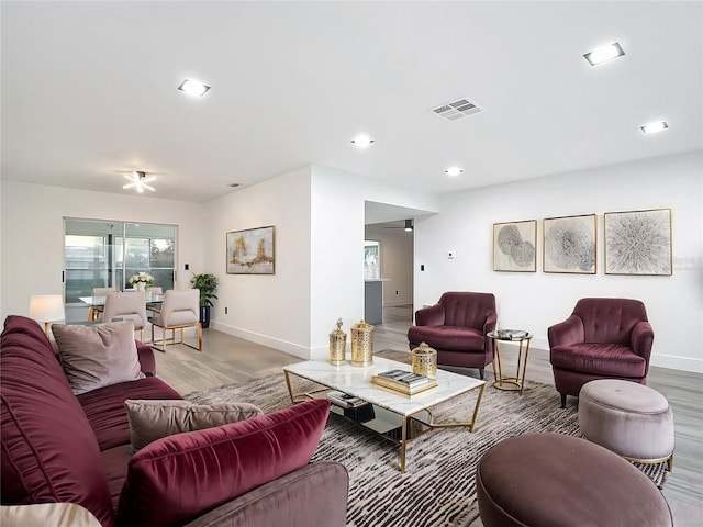 living room with hardwood / wood-style flooring